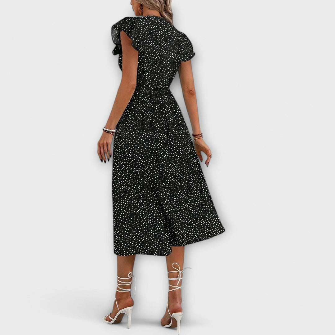 Vestido midi elegante con lunares