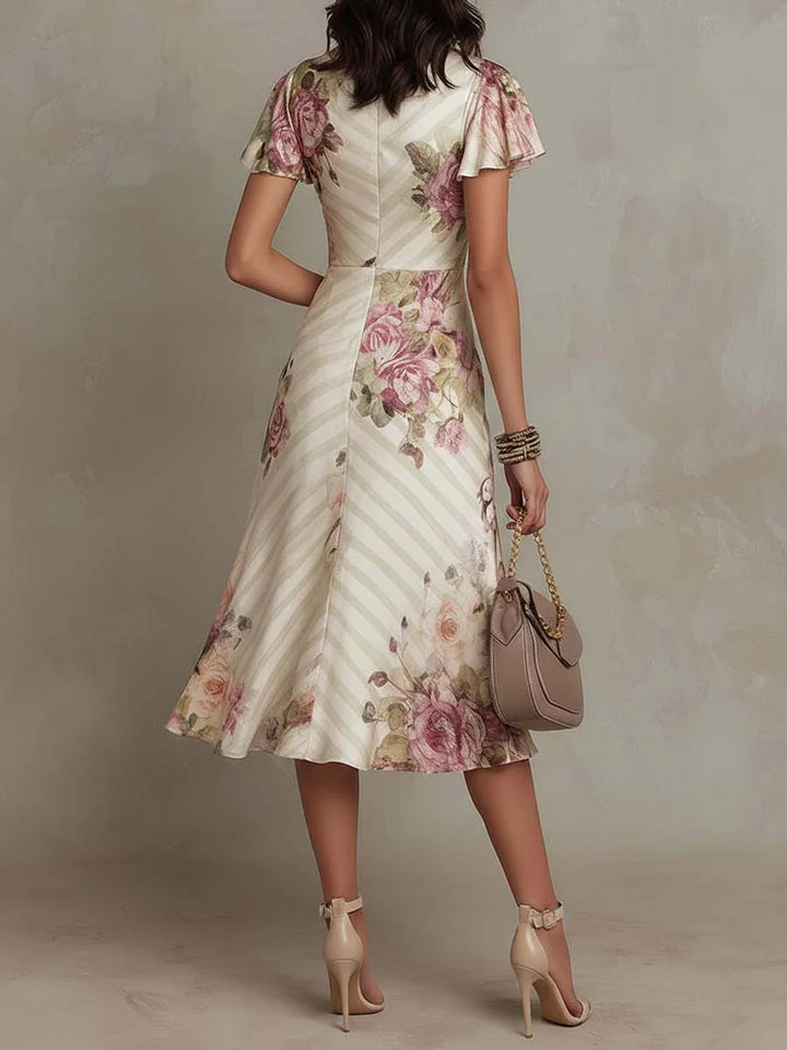 Alba | Vestido midi retro de satén con estampado floral elegante