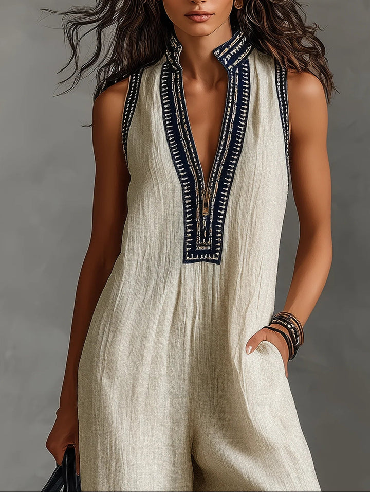 "Fiamma | Mono sin mangas con cuello alto" se puede reescribir como:

"Fiamma | Mono sin mangas de cuello alto