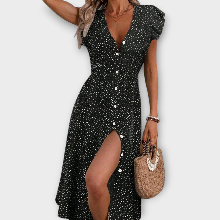 Vestido midi elegante con lunares
