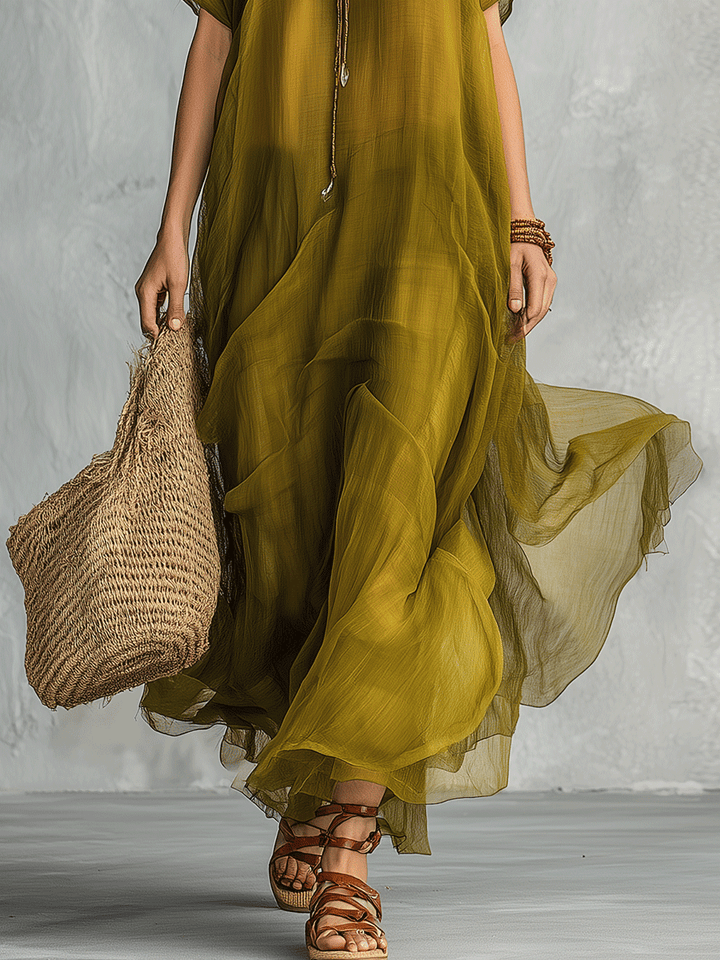 Vestido maxi bohemio verde oliva con silueta drapeada