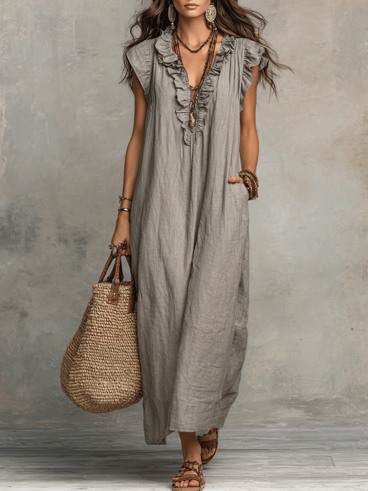 Vestido maxi bohemio sin mangas con escote en V y caída fluida
