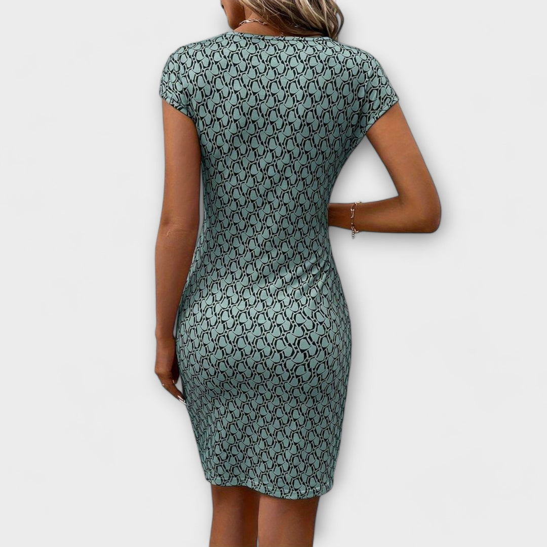 Emma - Vestido de manga corta en forma de tulipán con estampado all-over
