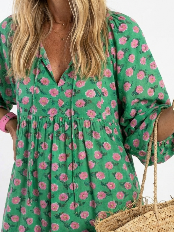 "Fiora | Vestido Midi de Gasa con Estampado Floral y Escote en V" puede reescribirse como:

"Fiora | Vestido Midi de Gasa con Diseño Floral y Escote en V