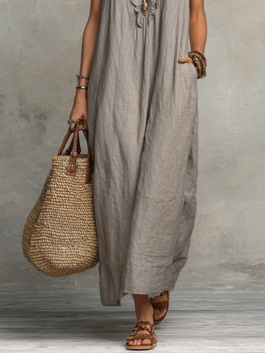 Vestido maxi bohemio sin mangas con escote en V y caída fluida