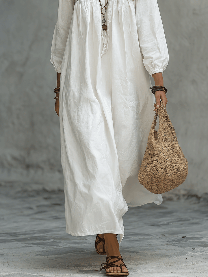 Vestido maxi blanco bohemio con bordado de flores y mangas globo