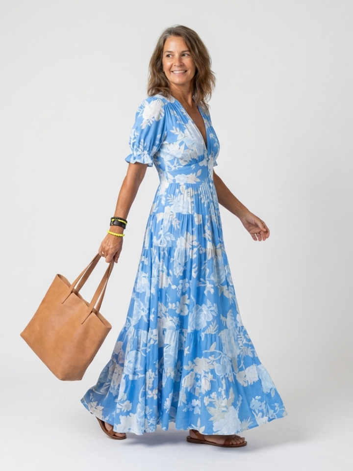 Ione | Vestido Midi Floral Sin Mangas con Escote en V" puede reescribirse como:

"Ione | Vestido Midi Floral Sin Mangas con Escote en Forma de V