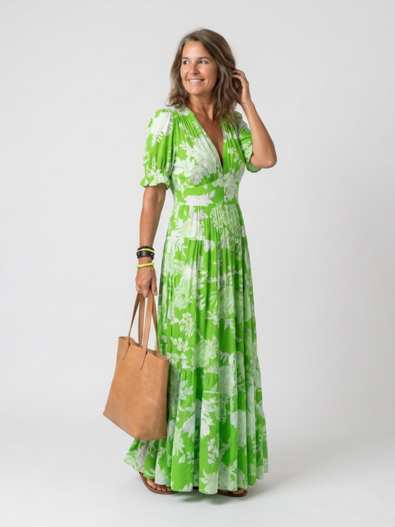 Ione | Vestido Midi Floral Sin Mangas con Escote en V" puede reescribirse como:

"Ione | Vestido Midi Floral Sin Mangas con Escote en Forma de V
