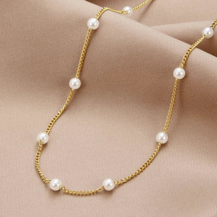 Anillo de oro con perla de agua dulce