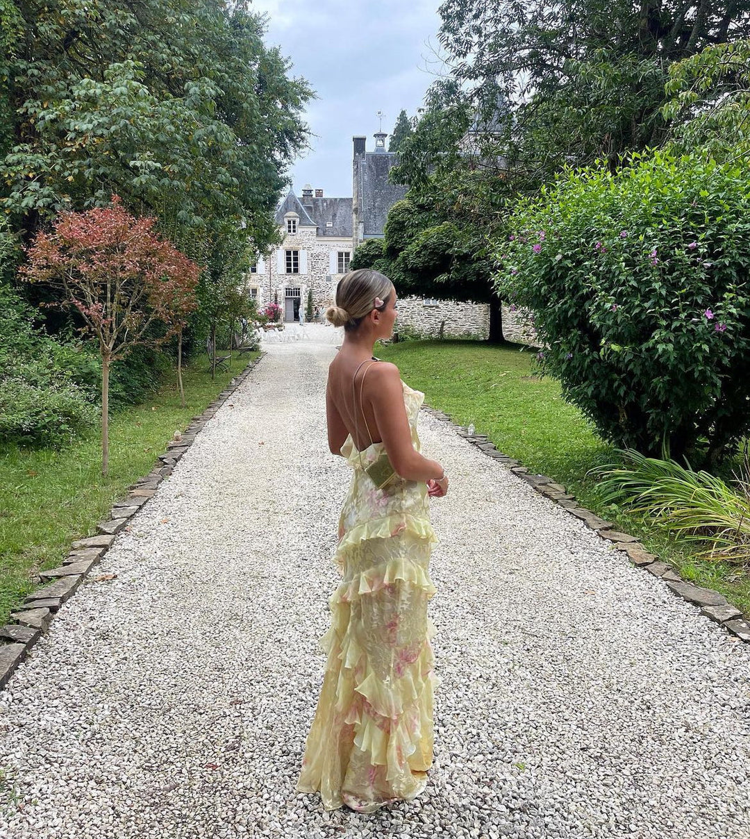 Olivia | Vestido maxi floral con volantes y espalda abierta