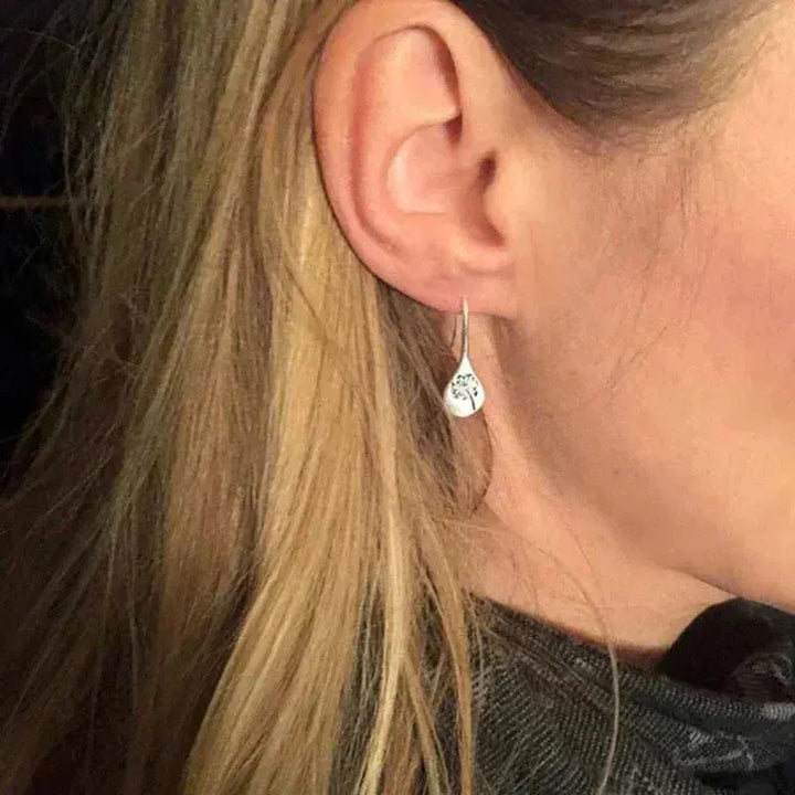 Pendientes de plata con forma de diente de león