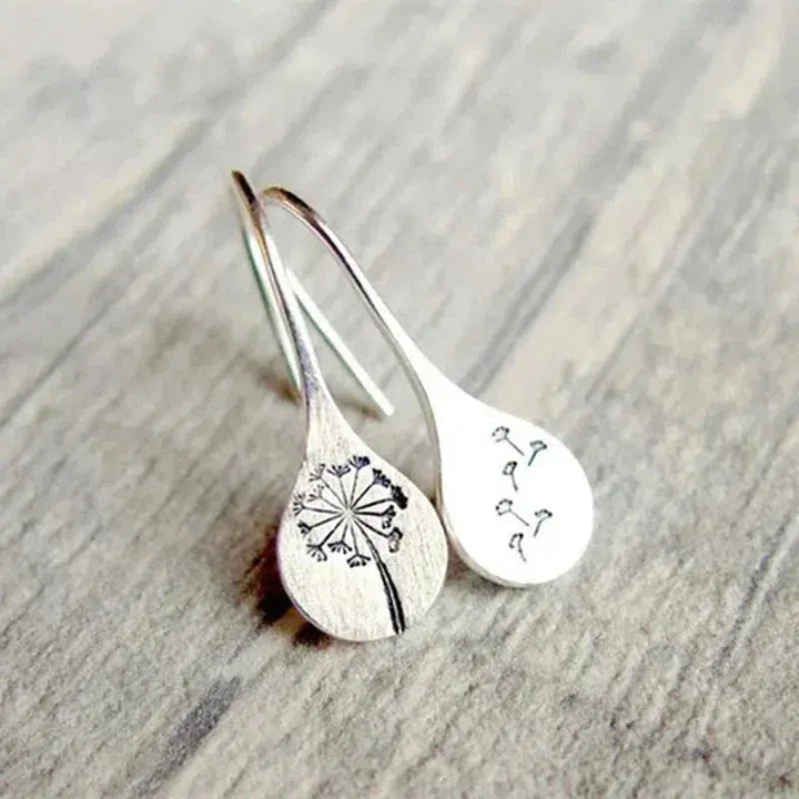 Pendientes de plata con forma de diente de león