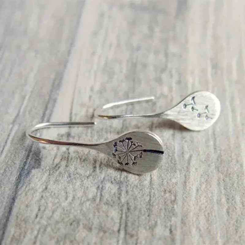 Pendientes de plata con forma de diente de león