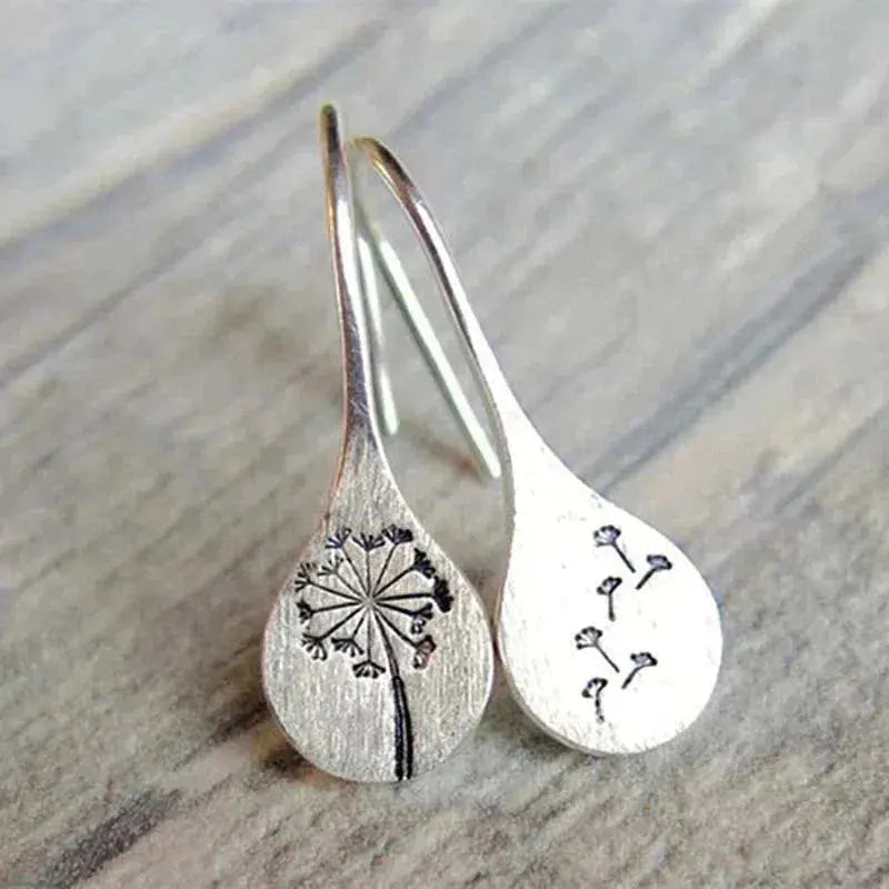 Pendientes de plata con forma de diente de león