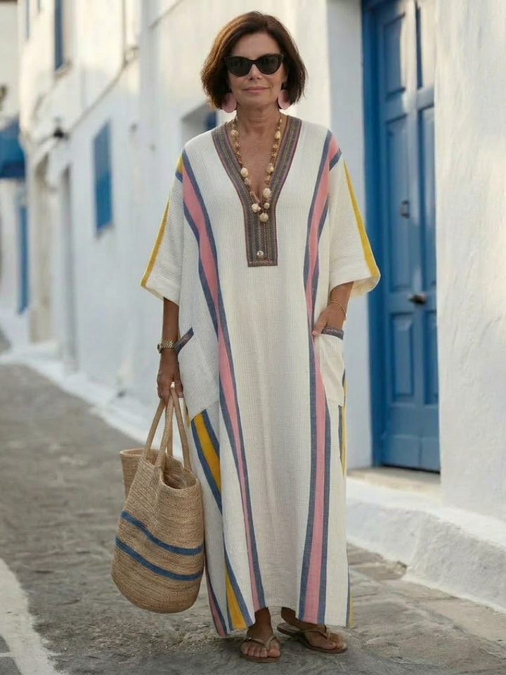 Noemi | Vestido Maxi de Manga Corta con Escote en V y Bolsillos" can be rewritten as:

"Noemi | Vestido Maxi de Manga Corta con Escote en V y Prácticos Bolsillos