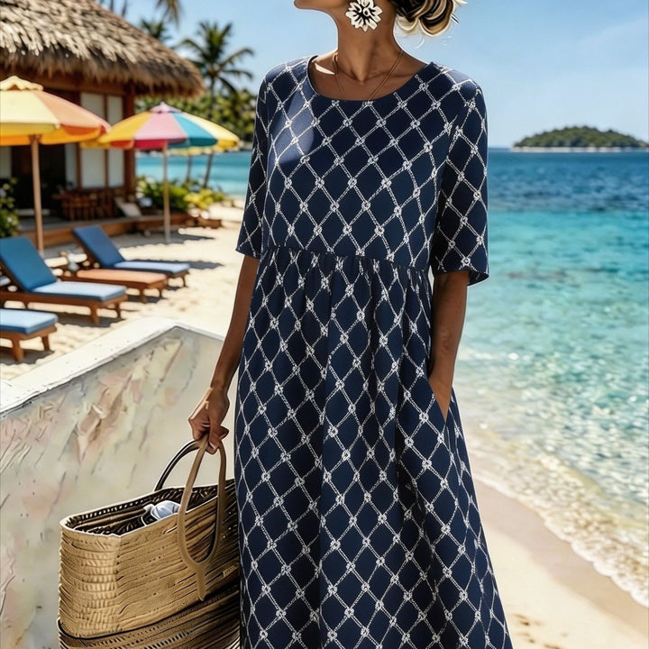 "Nadia™ | Vestido Midi de Elegancia Costera" se puede reescribir como "Nadia™ | Vestido Midi con Estilo Costero".