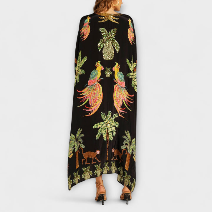 Linda - Vestido impresionante con tirantes asimétricos y estampado de palmeras