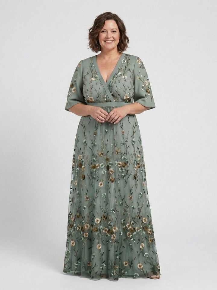 Evadne | Vestido Maxi Floral con Escote en V y Mangas Cortas" se puede reescribir como:

"Evadne | Maxi Vestido Floral con Escote en V y Mangas Cortas
