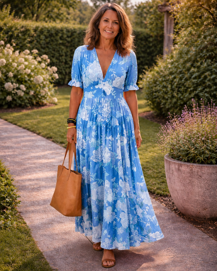 Ione | Vestido Midi Floral Sin Mangas con Escote en V" puede reescribirse como:

"Ione | Vestido Midi Floral Sin Mangas con Escote en Forma de V
